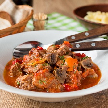 Meat with mushrooms and bell peppers