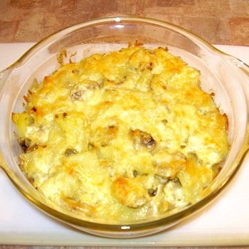 How to cook potatoes baked with mushrooms in the oven